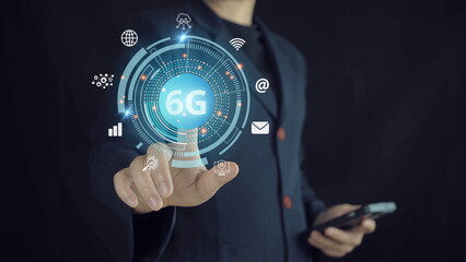6G Technology: Businessman holding the potential of ultra-fast connectivity, business and next-generation communication network.