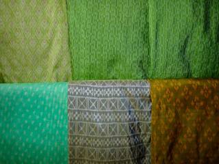 Handwoven fabric patterns and handwoven silk patterns of Thai people. Native fabric pattern, Praewa silk, Kalasin, handwoven products of the people of Isan, Thailand