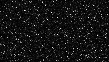 Dense, scattered speckles of light on a dark background.