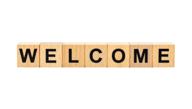 Wooden blocks arranged to spell "WELCOME" in bold black letters. - Powered by Adobe