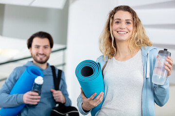 young couple going to the gym