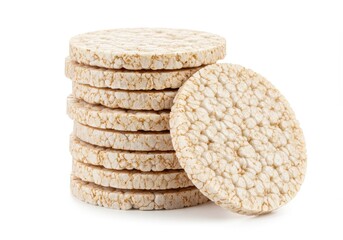 A stack of rice cakes is presented against a plain white background showing their texture and round shape.