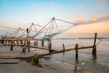 Chinese fishing nets on the shore of Kochi, Kerala in India, Cheena vala or tangkul, traditional stationary lift net