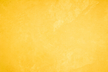 Yellow concrete stone texture for background in summer wallpaper. Cement and sand wall of tone vintage minimal. Concrete abstract wall of yellow color, cement texture white blank for home decor.