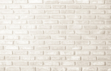 Detail of modern cream brick wall background photo. Brown light brick wall texture background for stone tile block painted in yellow light color wallpaper modern interior and exterior backdrop design.