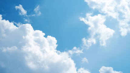 Fototapeta premium bright clear blue sky with soft, fluffy clouds forming elegant patterns