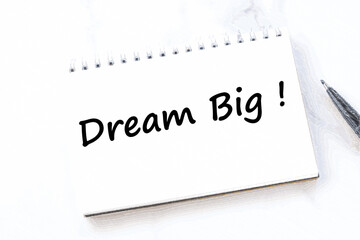 Dream Big, text words typography written on notebook, life and business motivational inspirational concept

