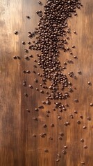 Dark Roasted Coffee Beans Spilling on Wood Surface Background