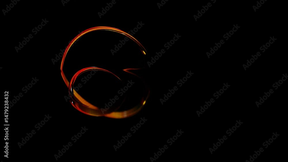 Poster abstract glossy swirling figure of thin round tubes with orange reflections deforms on black backgro