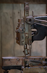 Detail of a Victorian sewing machine in a saddlery 