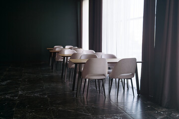 Empty chairs and tables in a cafe, vintage style, selective focus