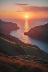 Fototapeta premium tropical beach island sunset with golden light over mountain view coastal photography horizon scenic nature landscape photography for wallpaper background