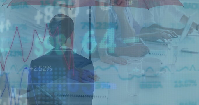 Image of financial data and graphs over back view of businesswoman with umbrella - Powered by Adobe