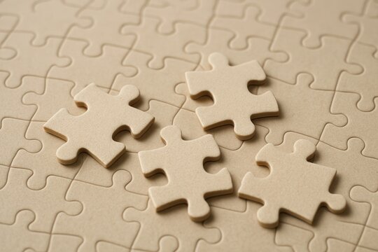 Puzzle pieces on board.