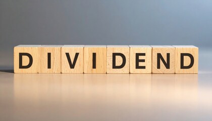 Closeup of dividend wooden blocks on polished surface business concept illuminated environment