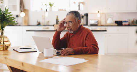 Senior man, laptop and finance with stress in home, documents and review for pension funding....