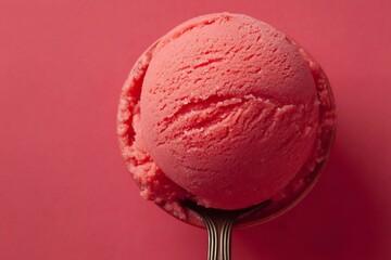 Strawberry ice cream on a spoon