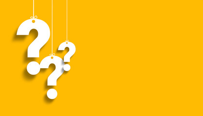 White question marks suspended by ropes on yellow background