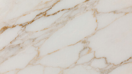 Elegant white marble surface with golden veins showing detailed natural stone texture close up