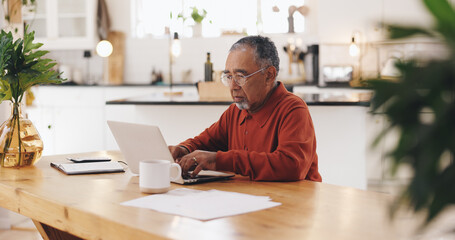 Senior man, laptop and taxes in kitchen with typing, documents and financial review for pension....