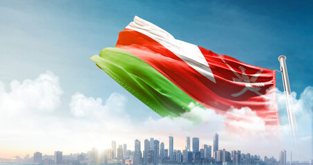 Oman national flag waving with skyline and buildings. Oman national flag for independence day.
