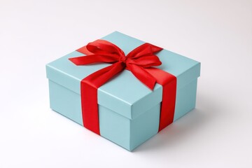 Fototapeta premium Light Blue Gift Box with Red Ribbon on White Background 