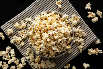 Homemade Butter Popcorn with Salt in a Bowl, top view.