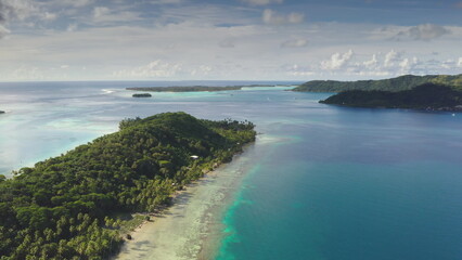 Stunning aerial drone footage captures the beauty of Bora Bora's lagoon, showcasing crystal-clear...