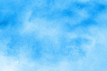 Hand painted blue watercolor background.