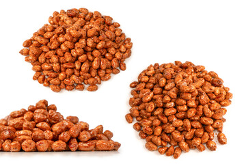 Tasty sweet roasted peanuts isolated on a white background.