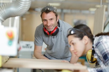 woman in professional training wood industrial site