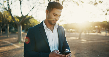 Fototapeta premium Business, outdoor and man with smartphone, typing or social media with morning commute, texting or expert. Person, ecology specialist or employee in city, cellphone or online reading with message