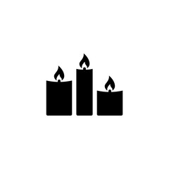 Black silhouette of three lit candles of varying heights for spa and wellness concepts