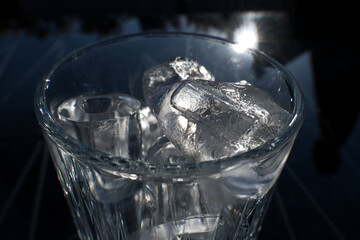 Ice cubes in a glass. Close up. Selective focus.