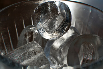 Ice cubes in a glass. Close up. Selective focus.
