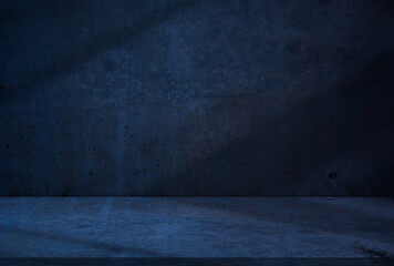 Blue background.Shadow and Light effect on Cement texture wall room and concrete floor,Room studio shot with loft concrete and abstract surface pattern for product display,Image minimalist background