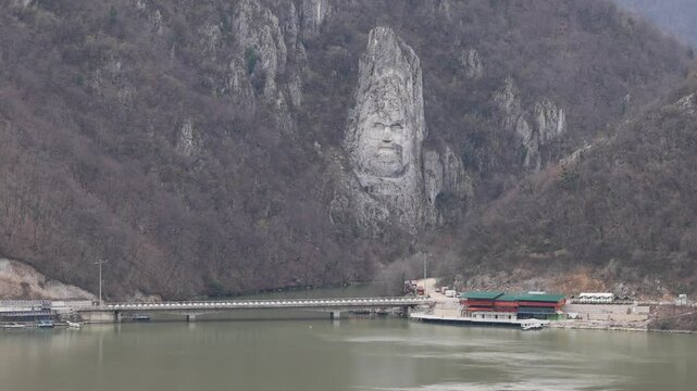 Rock Sculpture of Decebalus Colossal Face Carving in Stone at River Danube Gorge Iron Gate in Dubova Romania