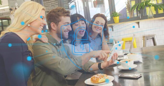 Group of marketers pointing at tablet in cafe, showing security padlock icon with nodes overlay - Powered by Adobe