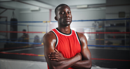 Workout, boxer and arms crossed with black man in gym for MMA fighter, training or athlete practice. Wrestling, martial arts and sports with portrait of person at boxing ring for exercise and fitness