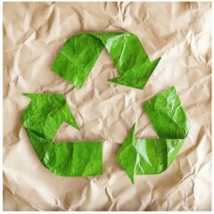 Green Recycle Symbol on Wrinkled Brown Paper Background Top View Close Up Eco Friendly Concept Sustainability