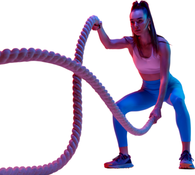 Full-body workout. Young sportive girl training, doing exercises with rope isolated on transparent background in neon light. Concept of sportive lifestyle, health, endurance, action, sport. Ad