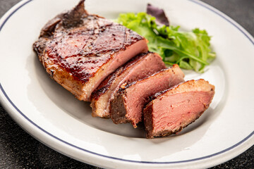 Duck breast roast meat poultry fresh delicious gourmet food background on the table rustic food top view copy space