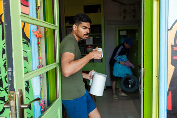 Colourful art hostel in old town with budget-friendly dorms, painted walls, shared kitchen, urban...