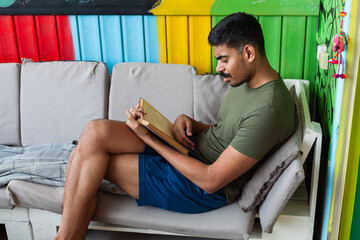Colourful art hostel in old town with budget-friendly dorms, painted walls, shared kitchen, urban...