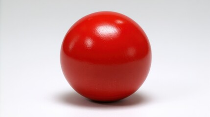Isolated Red Sphere on White Background Studio Shot Simple Geometric Shape Close Up Still Life Minimalist Composition