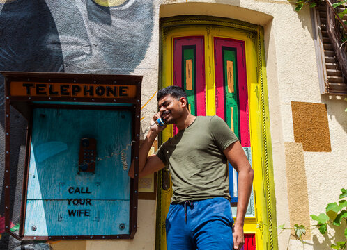 
Content distribution
Content distribution
100%
10
G60

Colorful budget-friendly art hostel in old town with painted walls. Diverse traveler stands near painted doors calls with retro street telephone