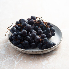 Dark grape on a plate