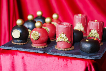cake, sweets in the shape of perfume bottles and candles