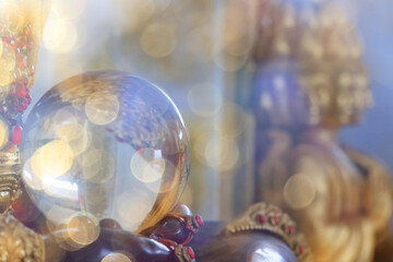 Fototapeta premium A glass magic ball in a mysterious Buddhist temple