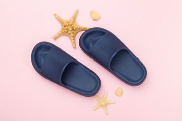 Blue sandals on color background,top view